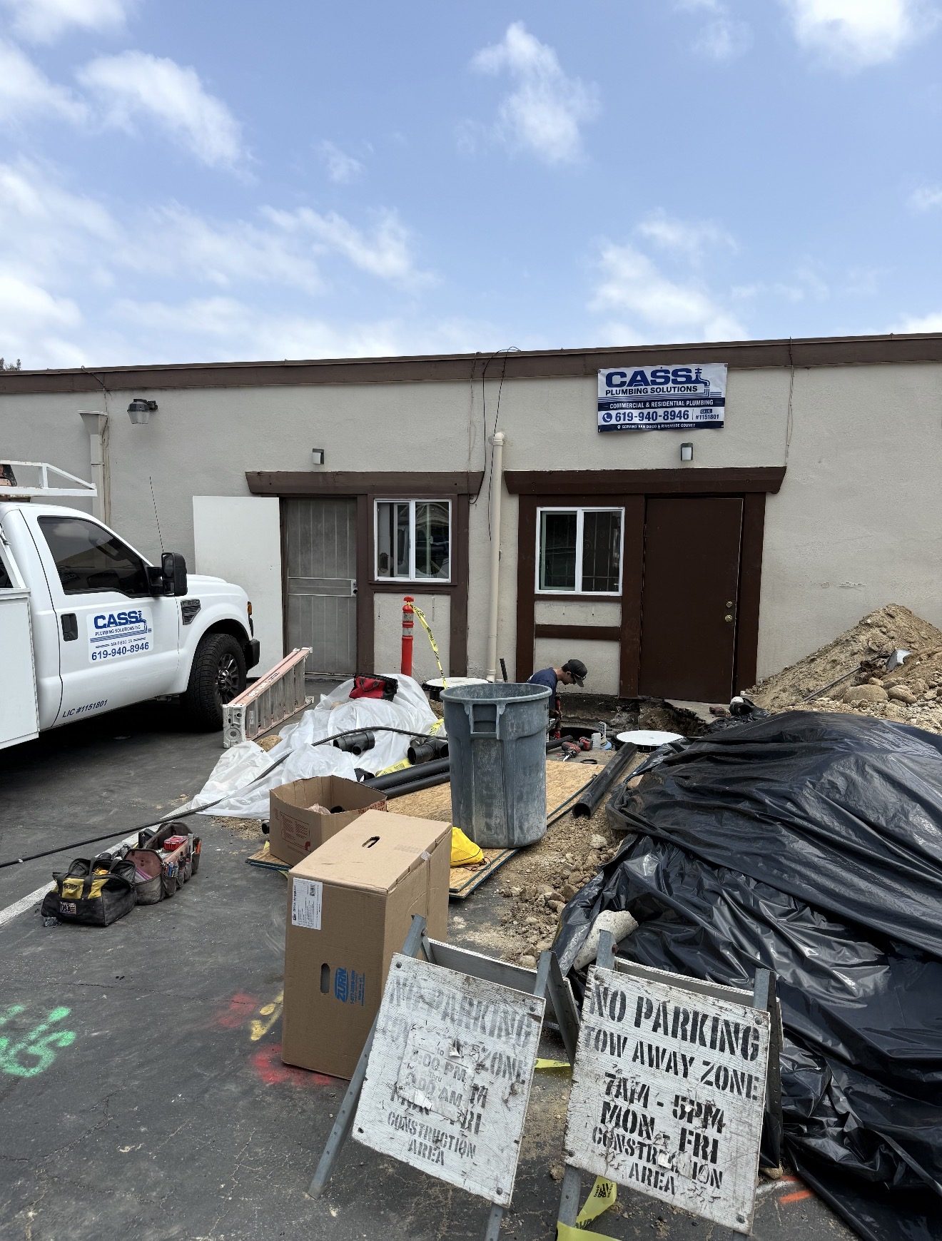 Cass Plumbing Solutions jobsite truck and sign